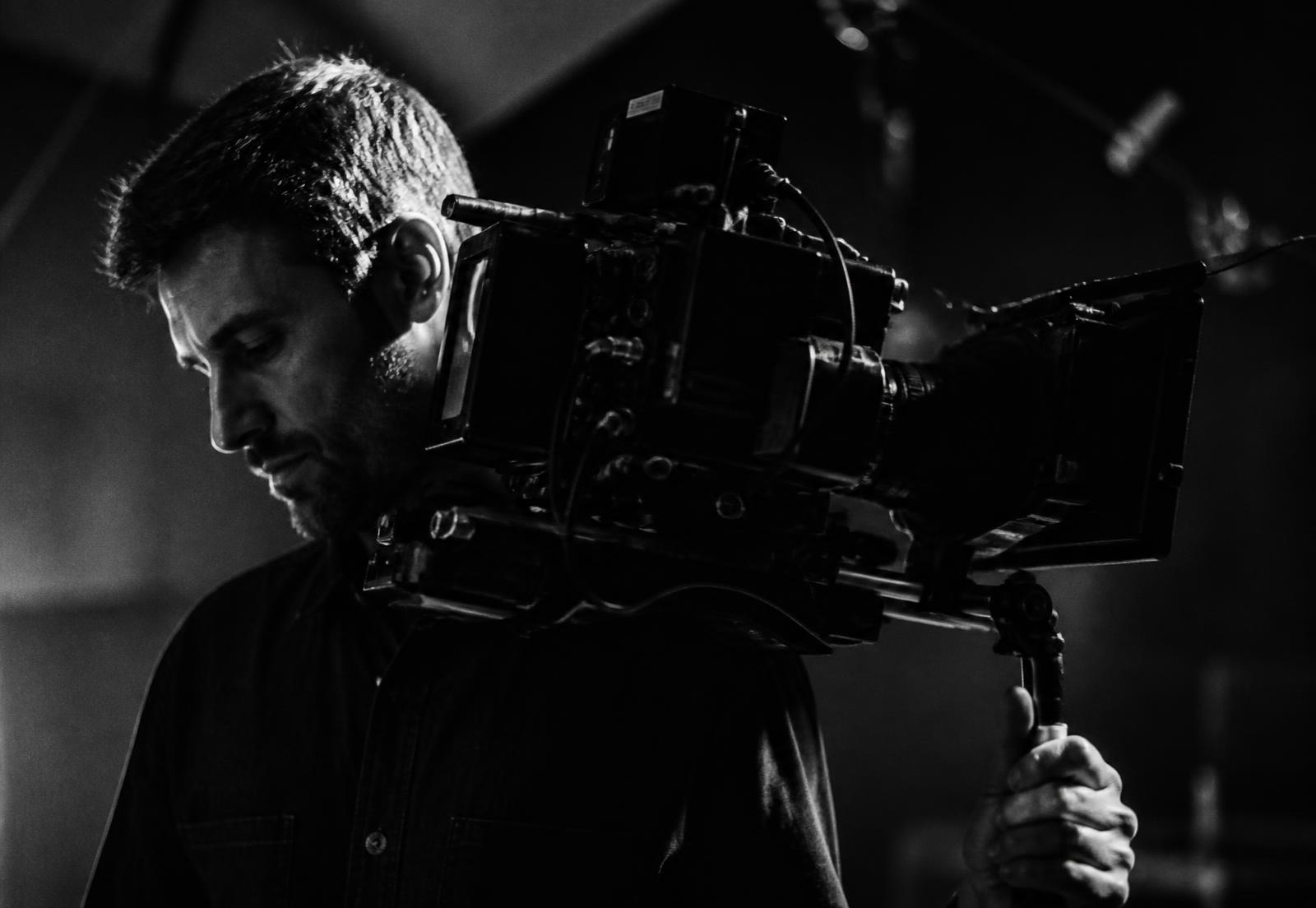 Cinema camera on a darkened production set